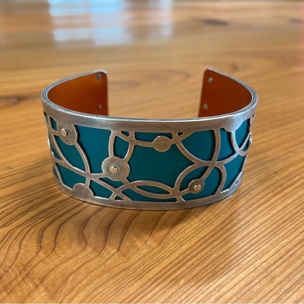 Silver and anodized aluminum cuff by New Orleans Artist GOGO. Teal and silver.